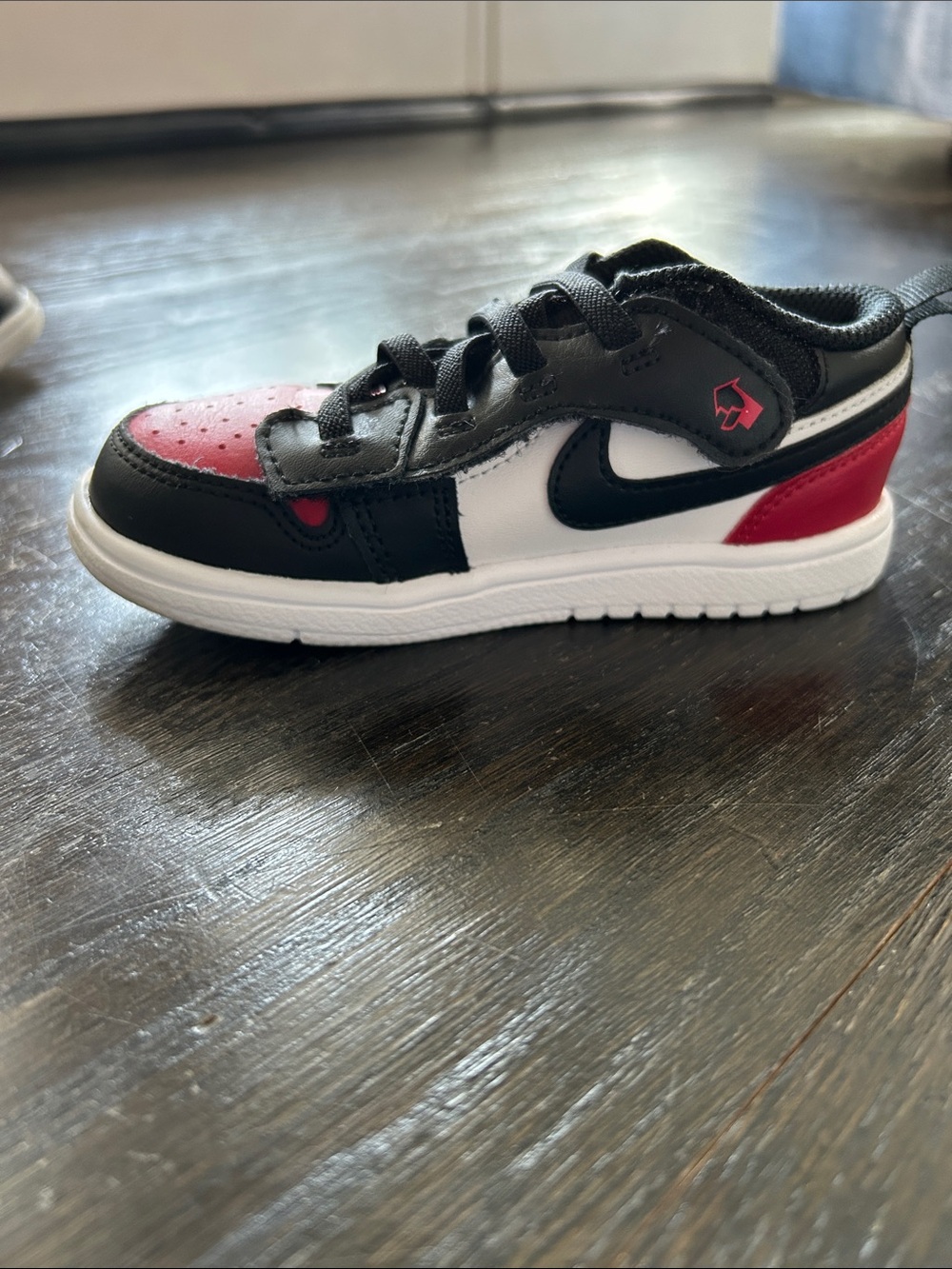 Nike Jordan 1 Low Kids Red Black White Low-Top Sneakers with Swoosh - Picture 3 of 6